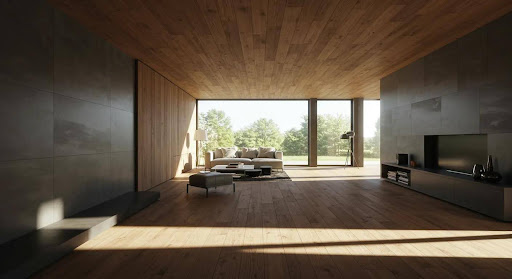 A modern living room featuring wooden floors and a large window that allows natural light to fill the space.